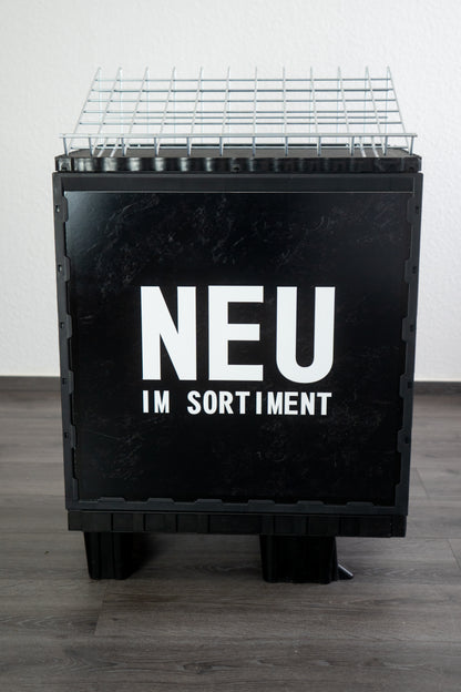 "Promotion-Sheet wide
Set of 2
Front BLACK textured "NEU IM SORTIMENT"
Back wood
